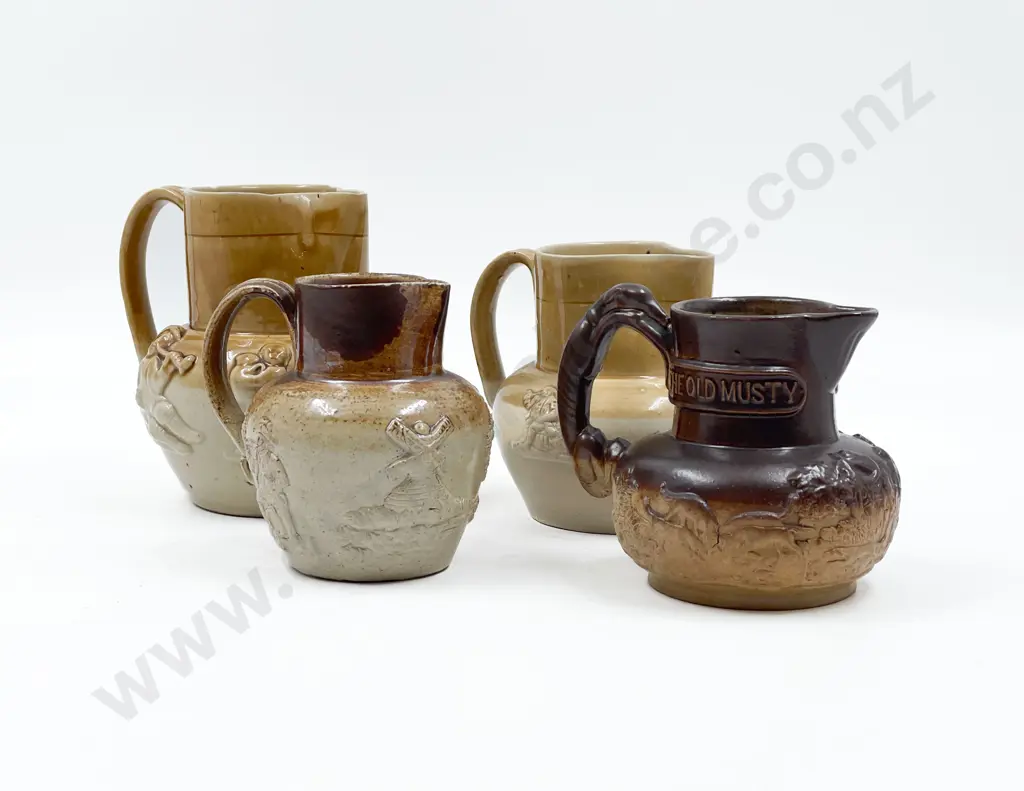 Four Stoneware Jugs Image 1++