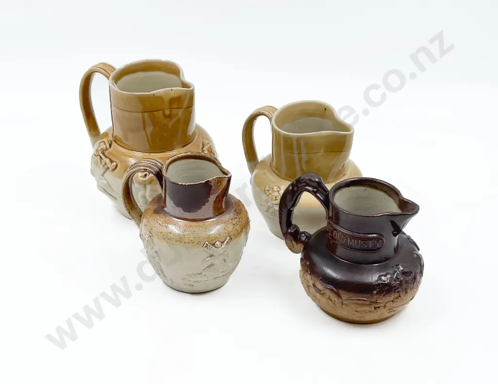 Four Stoneware Jugs Image 1++