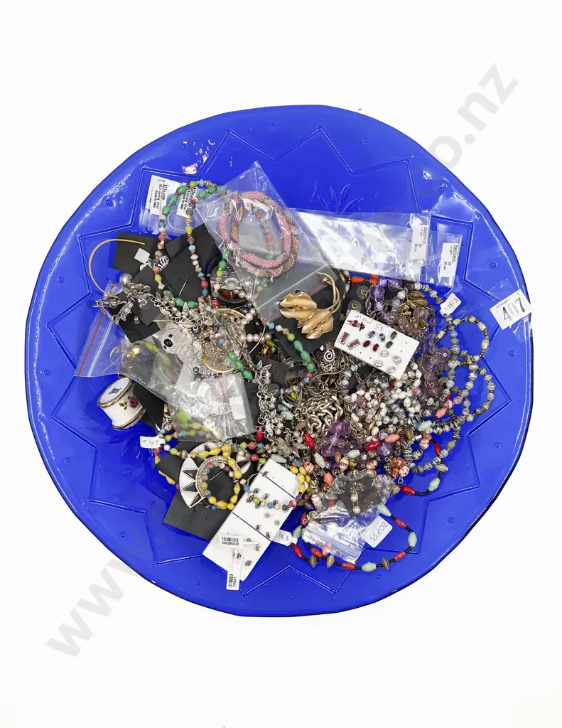 Quantity of Assorted Costume Jewellery on Blue Glass Charger Image 1++