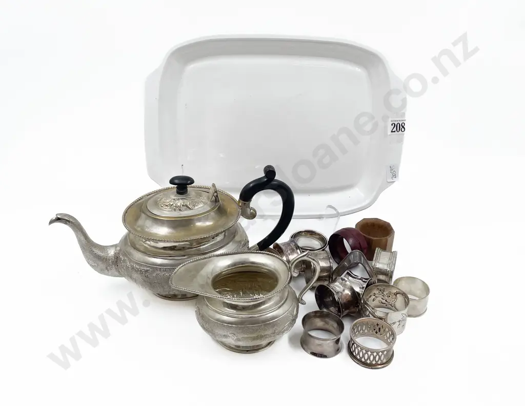 Collection of Various Napkin Rings with Indian Plate Teapot and Milk Jug Image 1++
