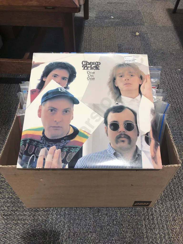 Box of Assorted Vinyl Records Including Cheap Trick and Dire Straits Image 1++