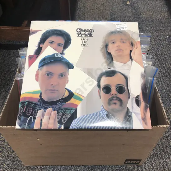 Box of Assorted Vinyl Records Including Cheap Trick and Dire Straits