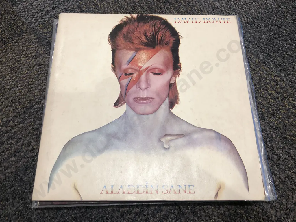 Seven Assorted David Bowie Records Image 1++