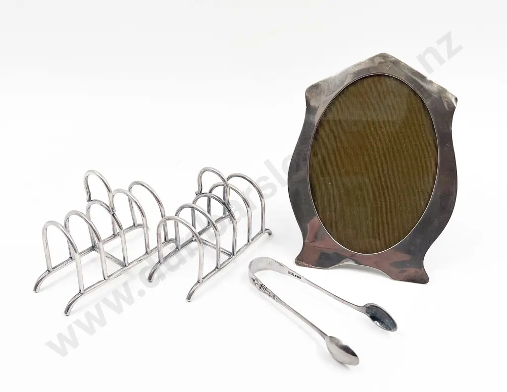 S/S Photo Frame and Tongs together with Pair of S/P Toast Racks Image 1++