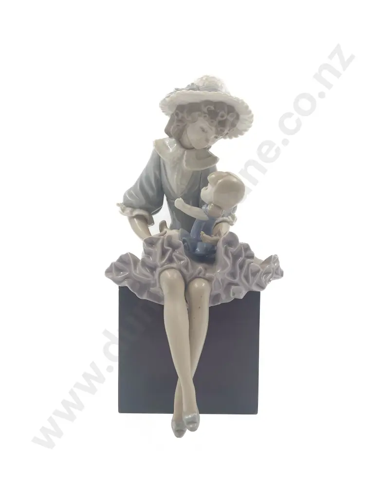 Lladro Seated Figure of Girl and Doll on Wooden Base Image 1++