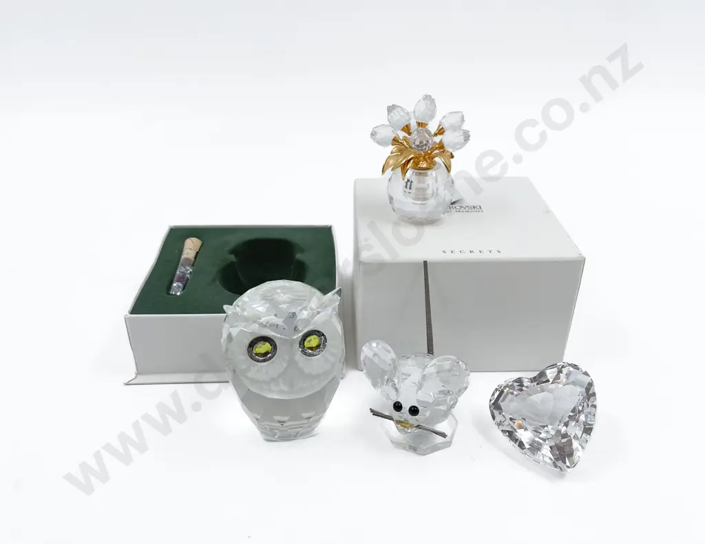 Four Swarovski Ornaments Image 1++