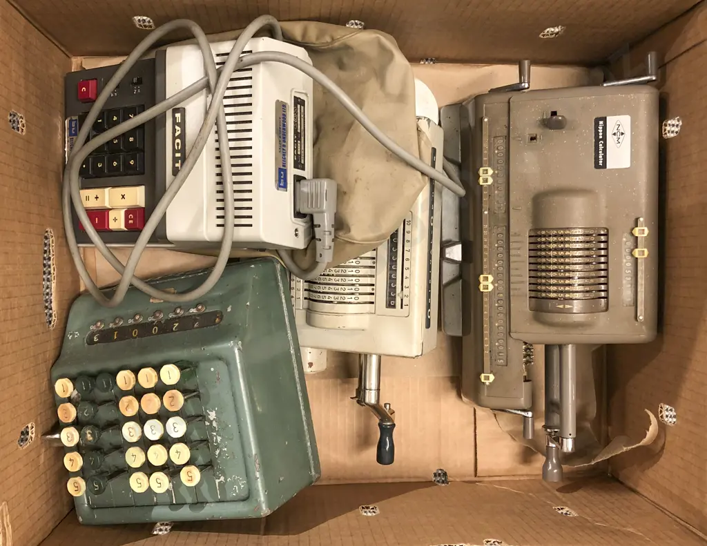 Four Assorted Vintage Calculators together with Boxed 8mm Projector Image 1++