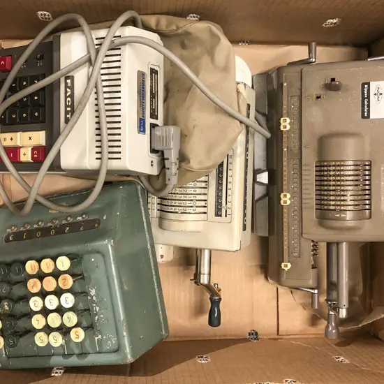 Four Assorted Vintage Calculators together with Boxed 8mm Projector