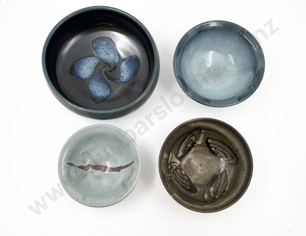 Four Assorted Pottery Bowls Image 1++