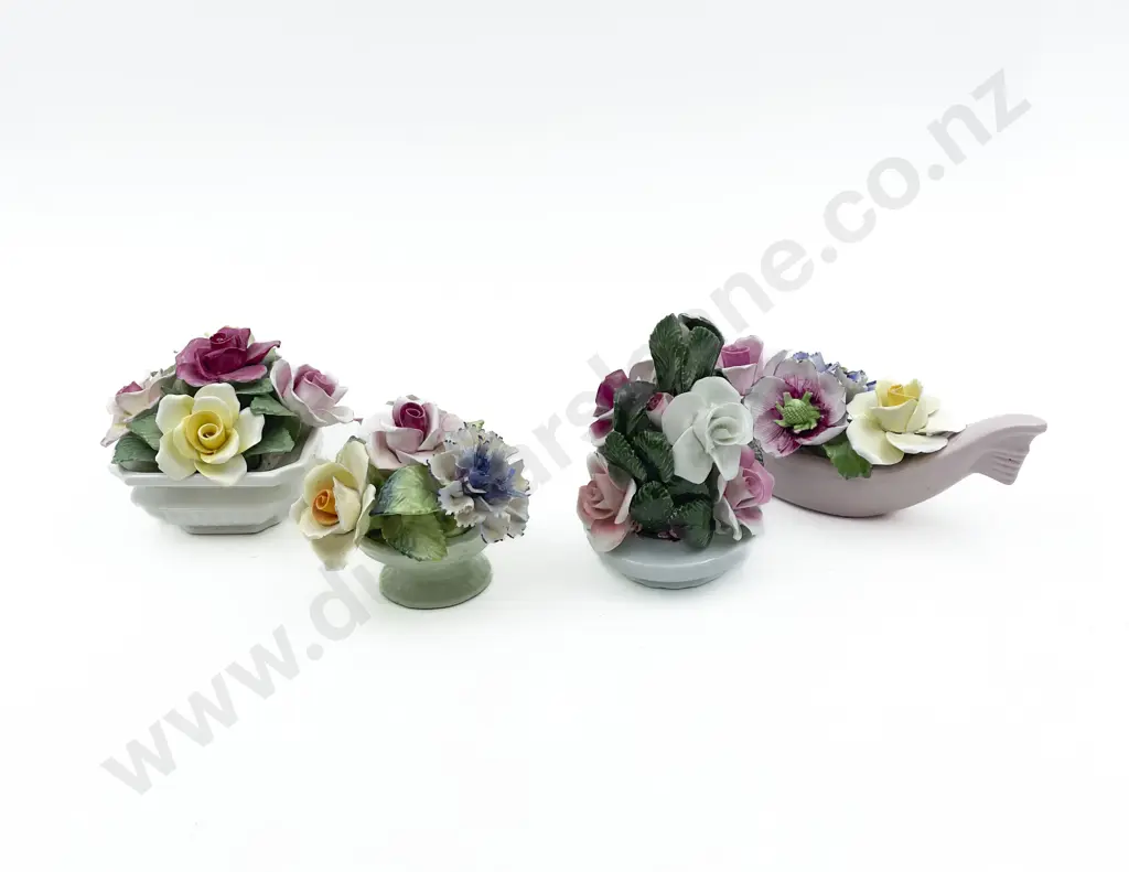 Four Assorted Ceramic Flower Ornaments Image 1++
