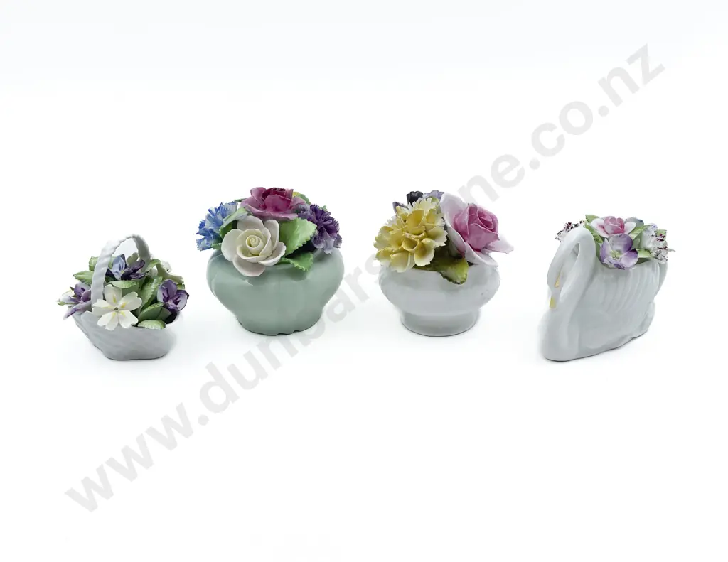 Four Assorted Ceramic Flower Ornaments Image 1++