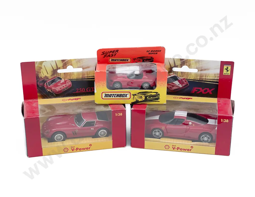 Two Boxed Shell Model Cars together with Match Box Model Car Image 1++