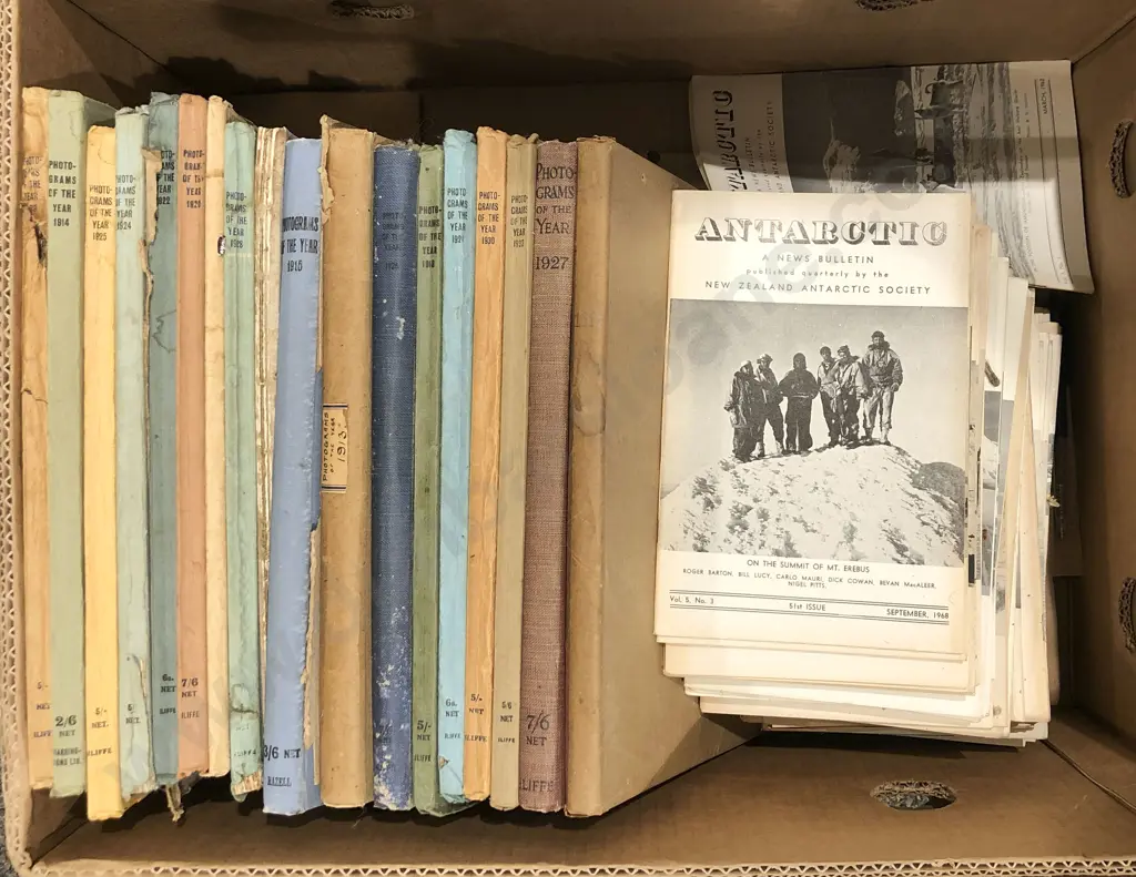 Box of Antarctic Journals and Photographs of the Year Annuals Image 1++