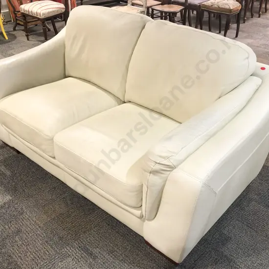 Cream Leather Two Seater Sofa