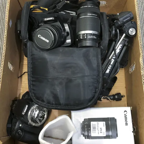Two Canon Cameras with Assorted Accessories