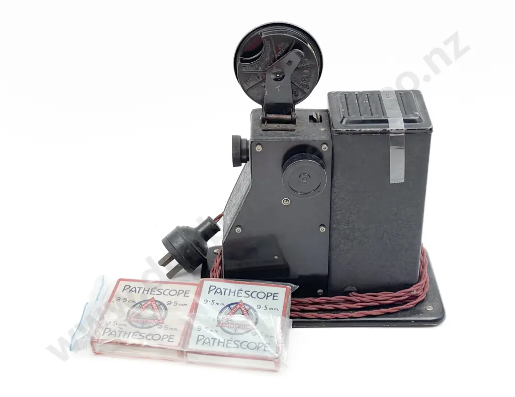 Vintage Hand Operated Projector with Reels Image 1++