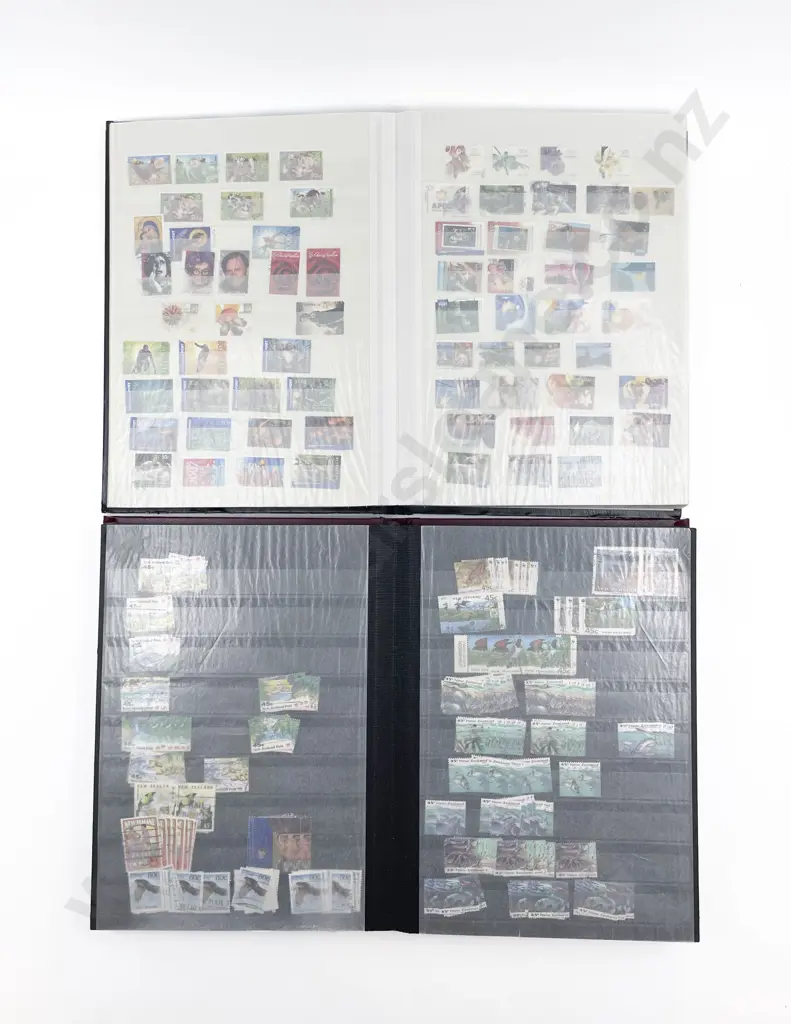 Two Stamp Albums Image 1++