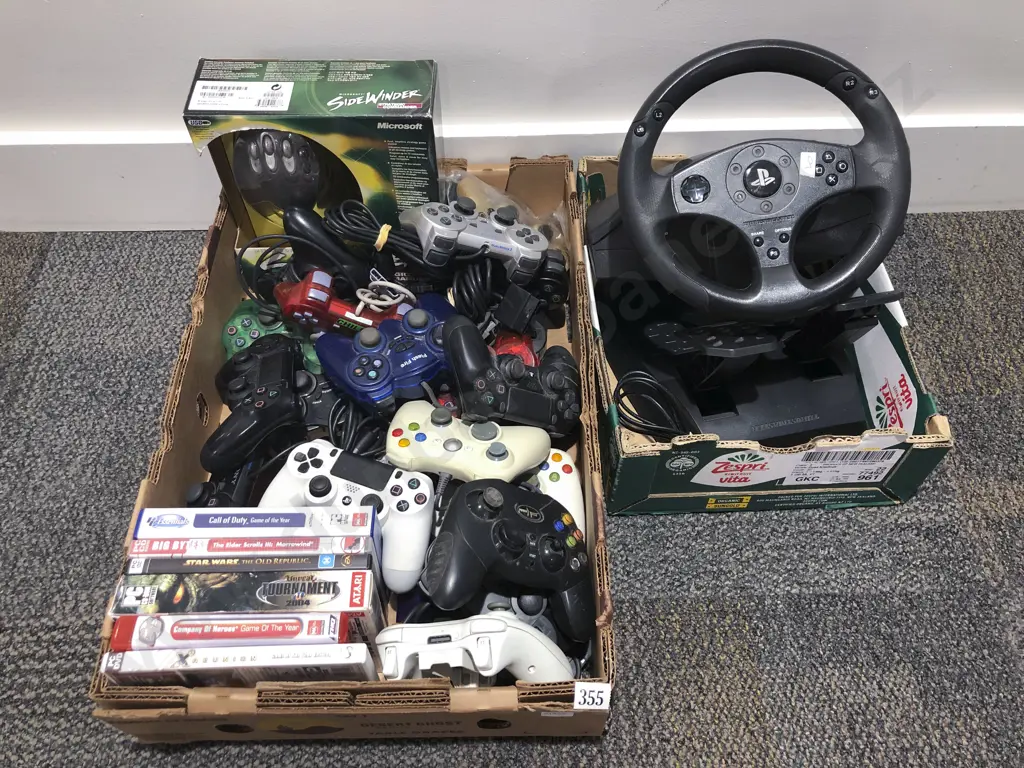 Quantity of Assorted Console Controllers with PlayStation Steering Wheel etc Image 1++