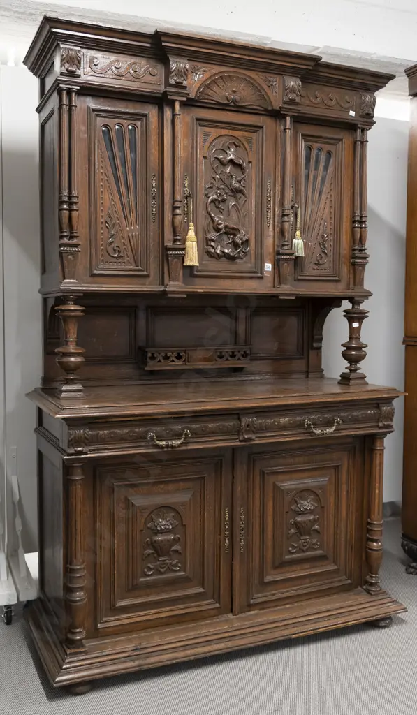 Late C19th European Oak Two Stage Dresser. The breakfront top with three doors central door carved with dragon Image 1++