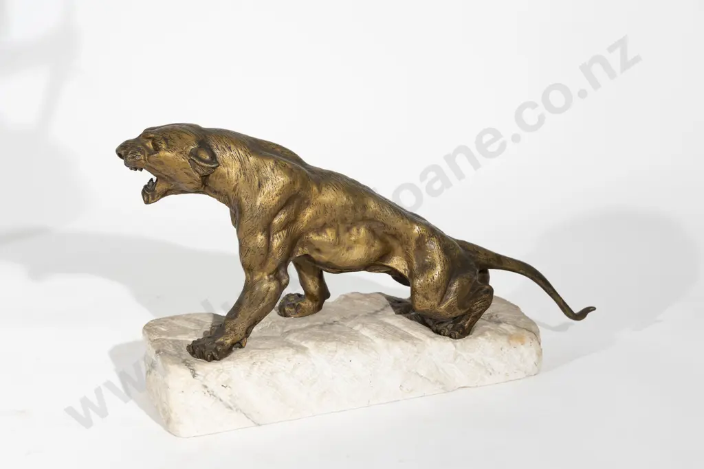 Bronze Lioness on Rough Marble Base Image 1++