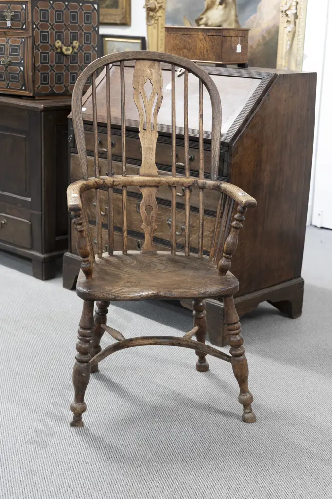 C19th Elm Windsor Chair of traditional form with pierced central splat Image 1++