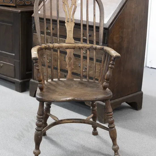 C19th Elm Windsor Chair of traditional form with pierced central splat