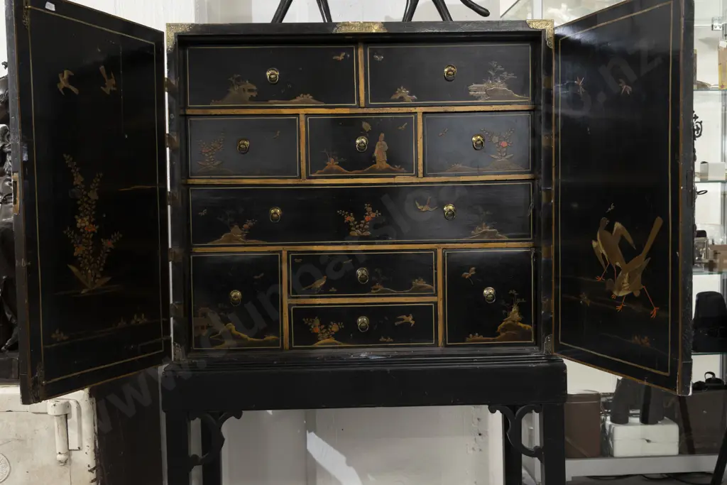 An Attractive Geo III Black Lacquered and Chinoiserie Cabinet on Stand the doors decorated with figures Image 1++