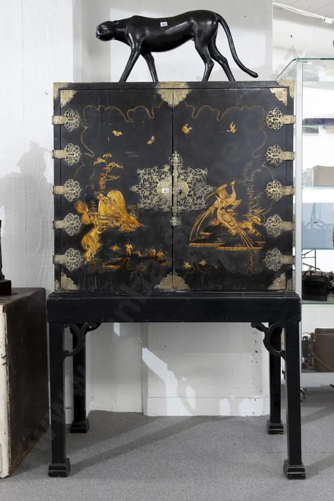 An Attractive Geo III Black Lacquered and Chinoiserie Cabinet on Stand the doors decorated with figures Image 1++