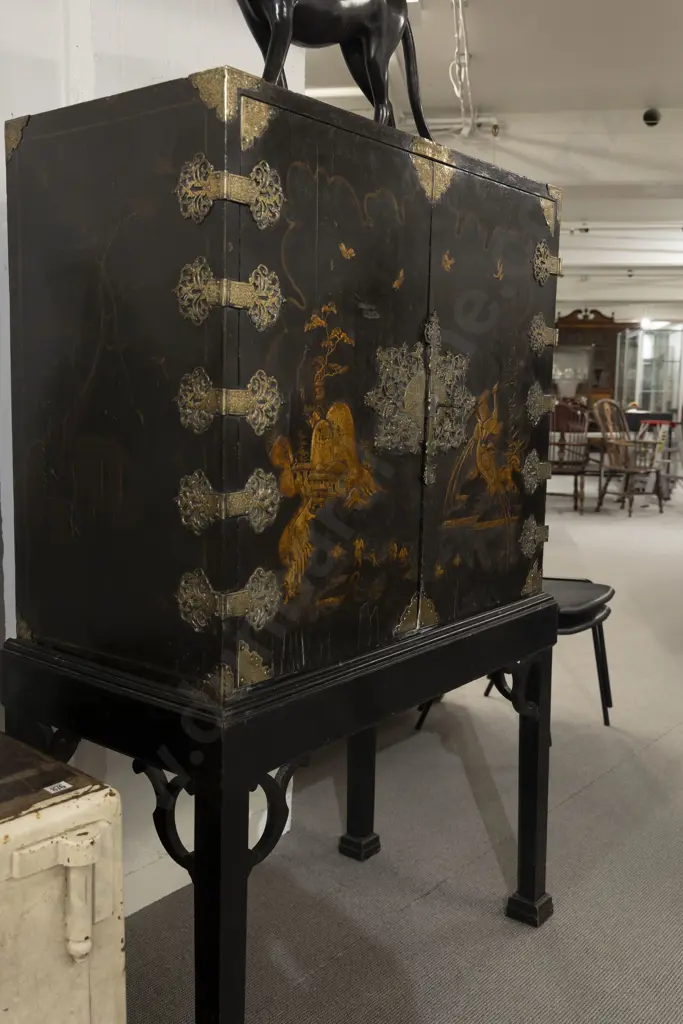 An Attractive Geo III Black Lacquered and Chinoiserie Cabinet on Stand the doors decorated with figures Image 1++