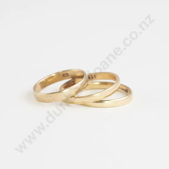 Three 18ct and 9ct Plain Wedding Bands