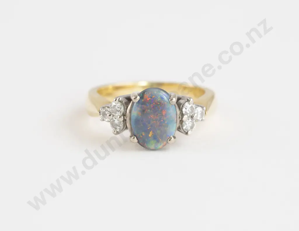 18ct Seven Stone Black Opal Doublet and Diamond Ring Image 1++