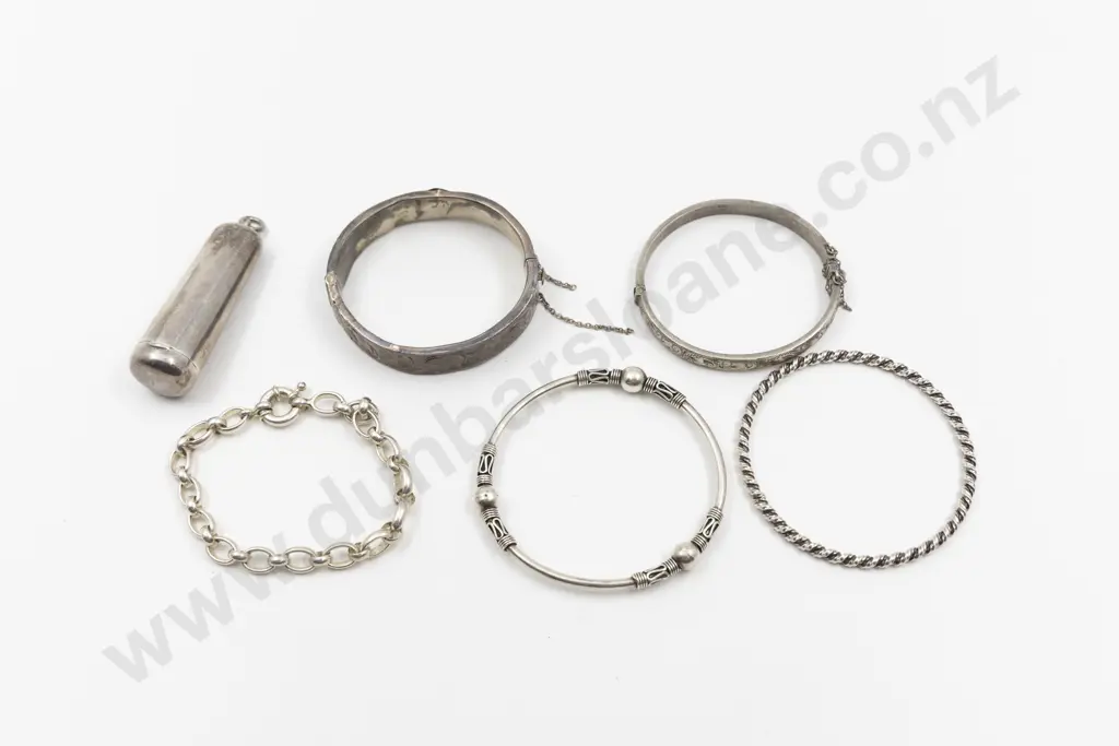 Two S/S Modern Design Bangles Image 1++