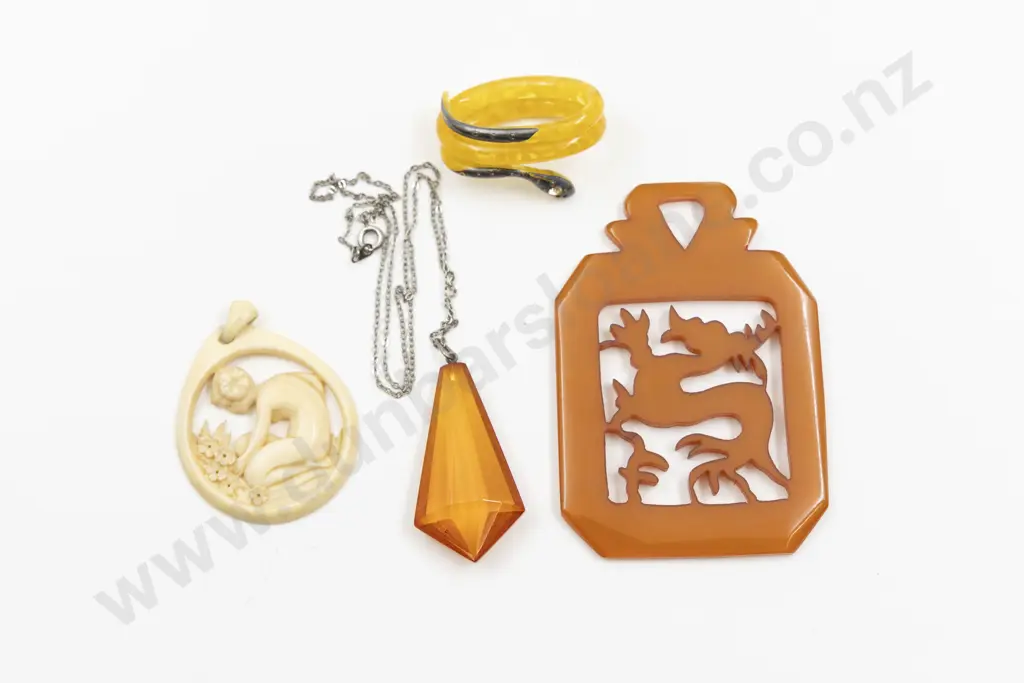 Three Art Deco Plastic Pendants and Snake Scarf Ring Image 1++