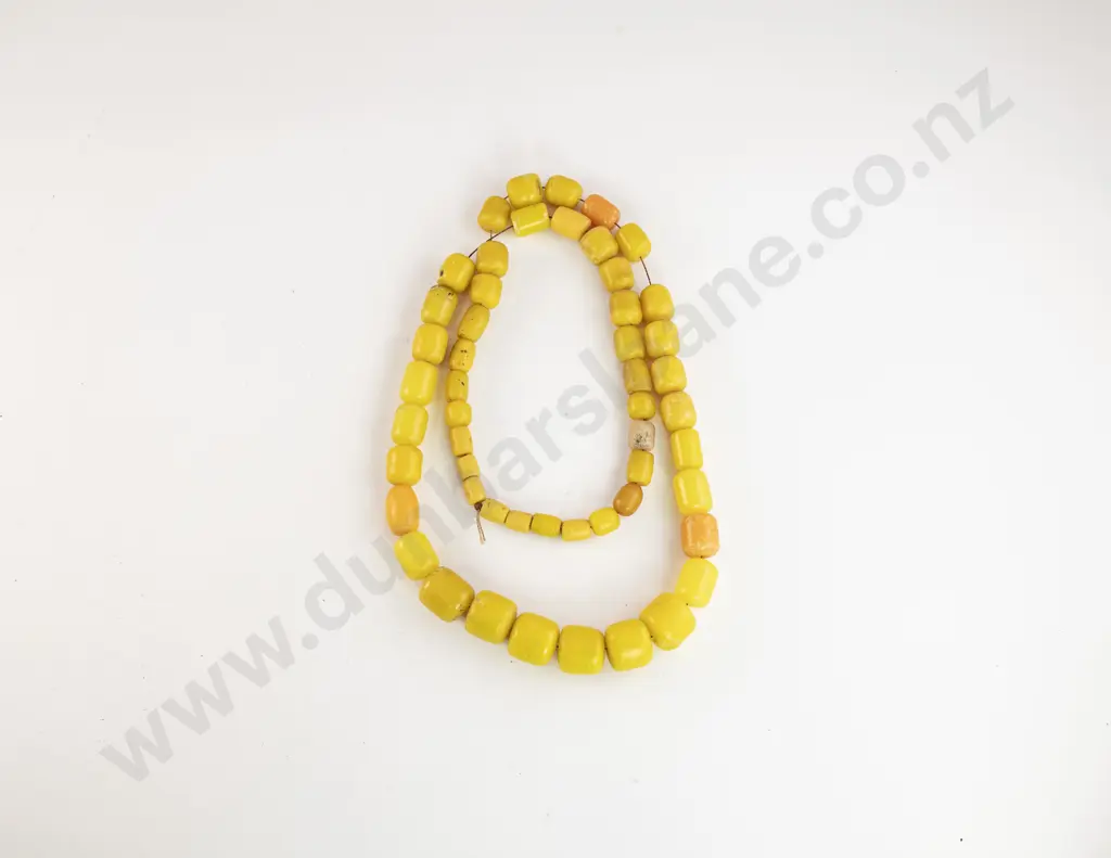 Length of Graduated Yellow Coral Beads Image 1++