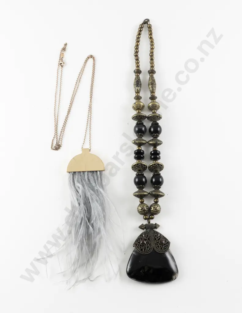 Two Modern Pendants One with Ostrich Feathers on 9ct Fine Curb Link Chain Image 1++