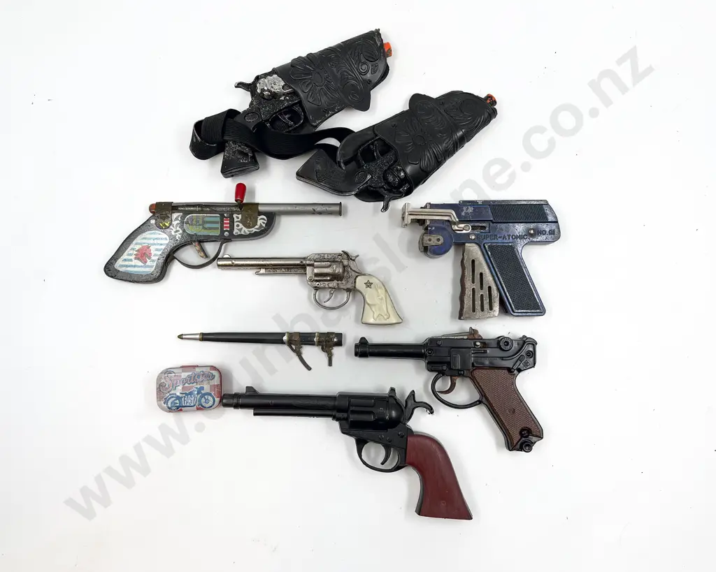 Seven Toy Pistols including No91 Super-Atomic Image 1++