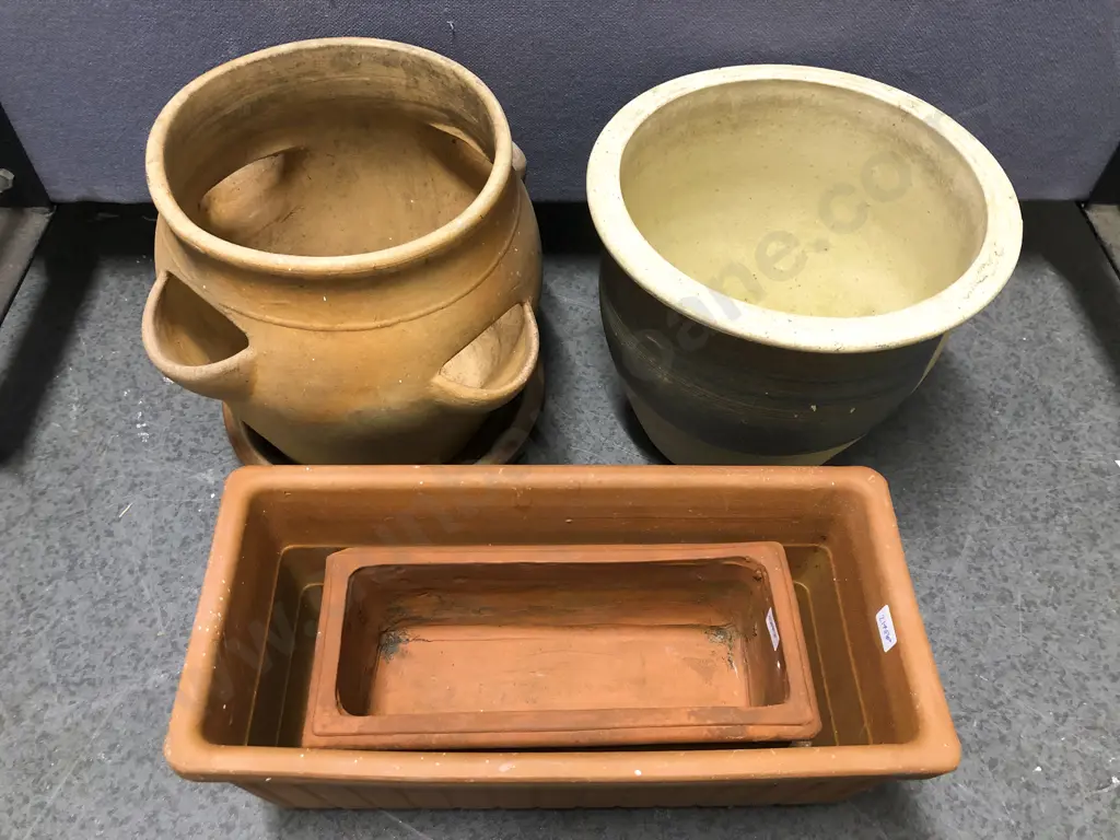 Four Assorted Garden Pots Image 1++