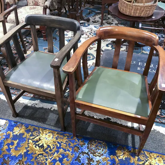 Two Leather Seated Tub Chairs