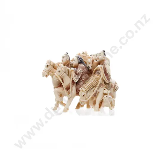 Signed and Stained Ivory Netsuke of a Group of Four Huntsman on Horseback