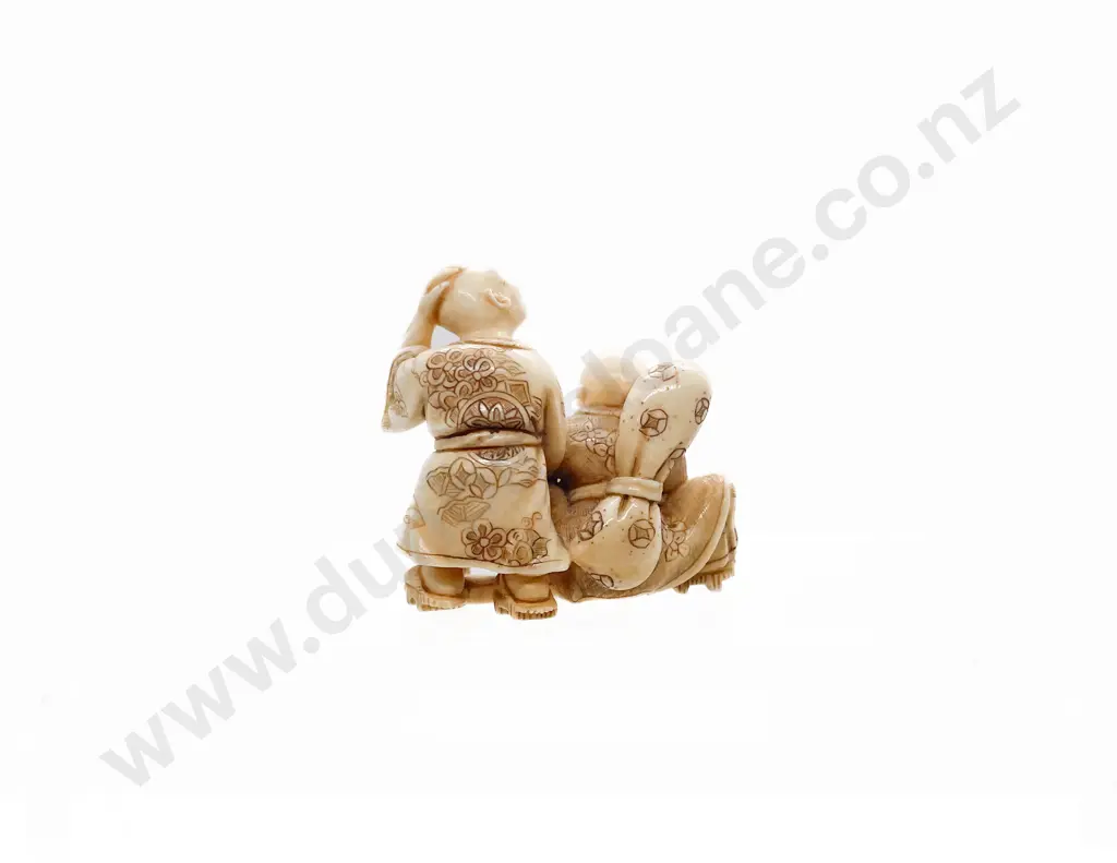 Signed and Stained Ivory Netsuke of a Two Travellers Image 1++