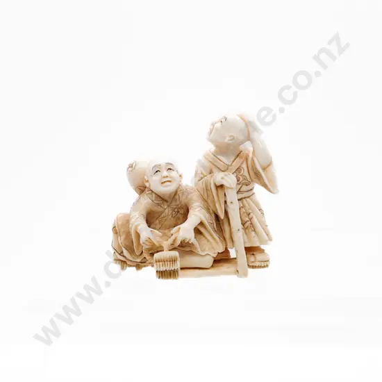 Signed and Stained Ivory Netsuke of a Two Travellers