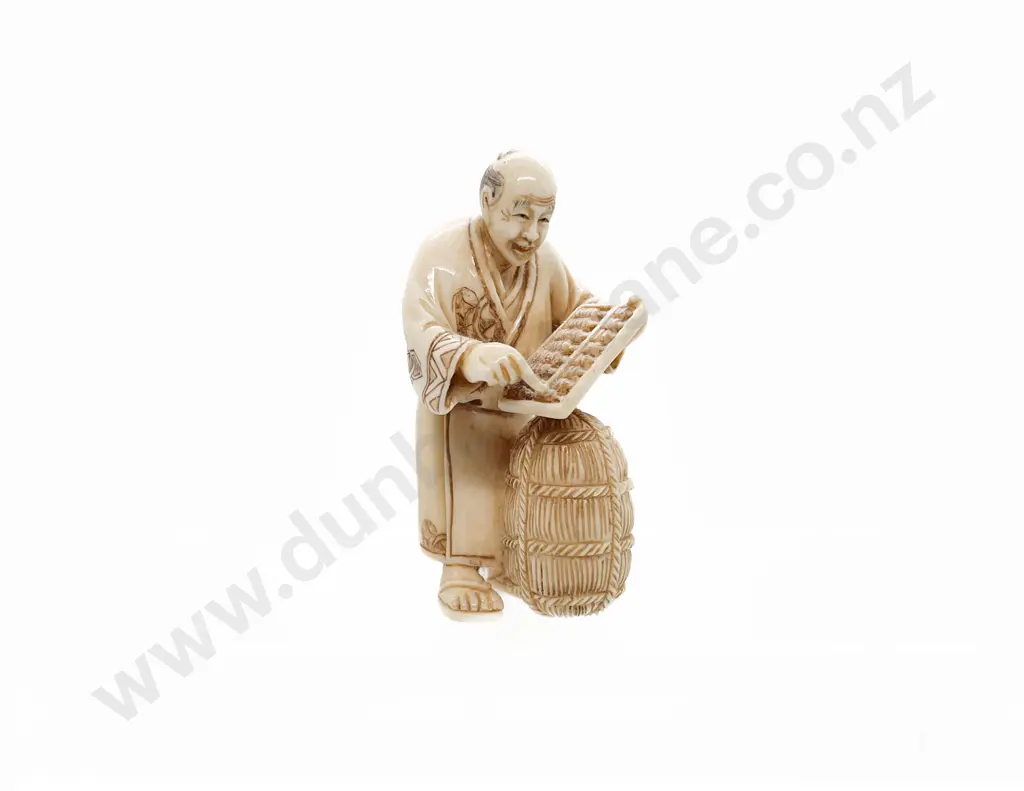 Signed Ivory Netsuke of Trader with Rice Bale and Abacus Image 1++
