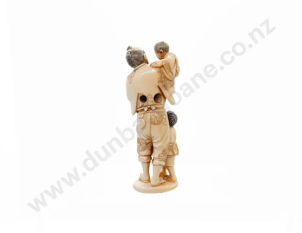 Signed Ivory Netsuke of a Grandfather with His Two Grandsons Image 1++