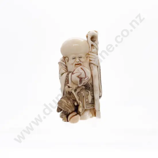 Signed and Stained Ivory Netsuke of a Standing Immortal