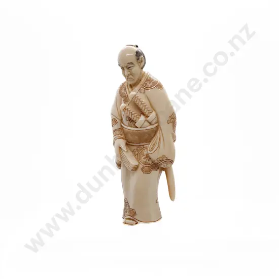 Signed Ivory Netsuke of a Feudal Retainer Wearing Two Katana and Holding Fan