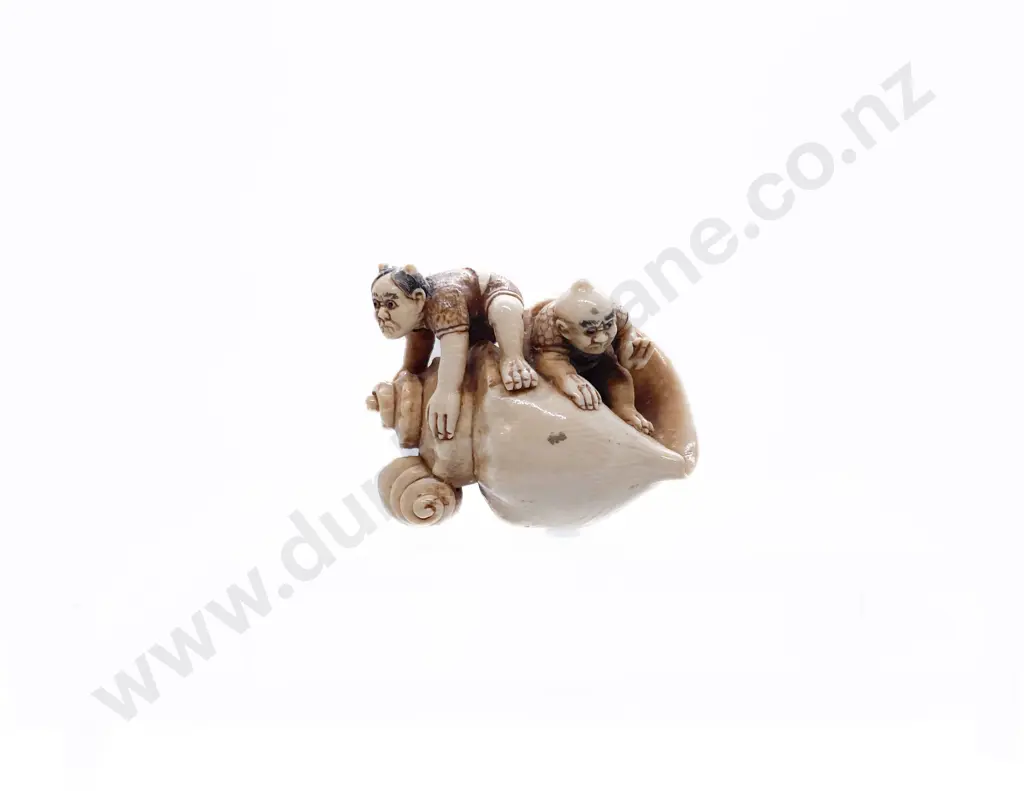 Signed and Stained Ivory Netsuke of a Two Demons on an Giant Conch Shell Image 1++