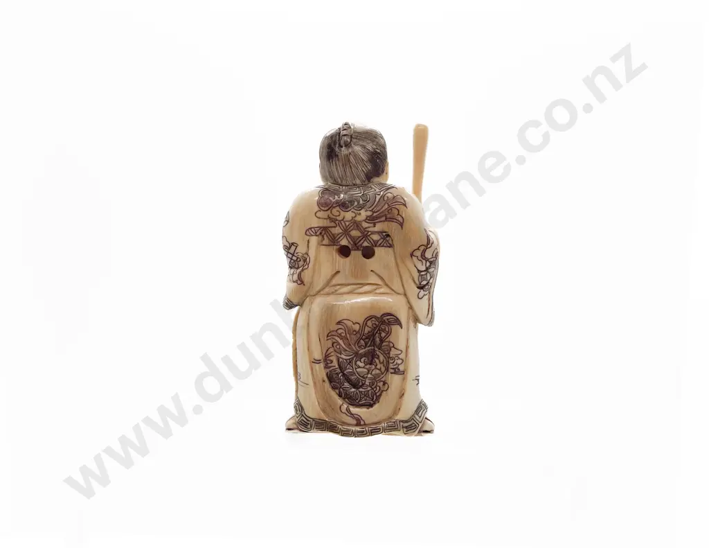 Signed and Stained Ivory Netsuke of a Fisherman Standing holding Good Sized Catch Image 1++