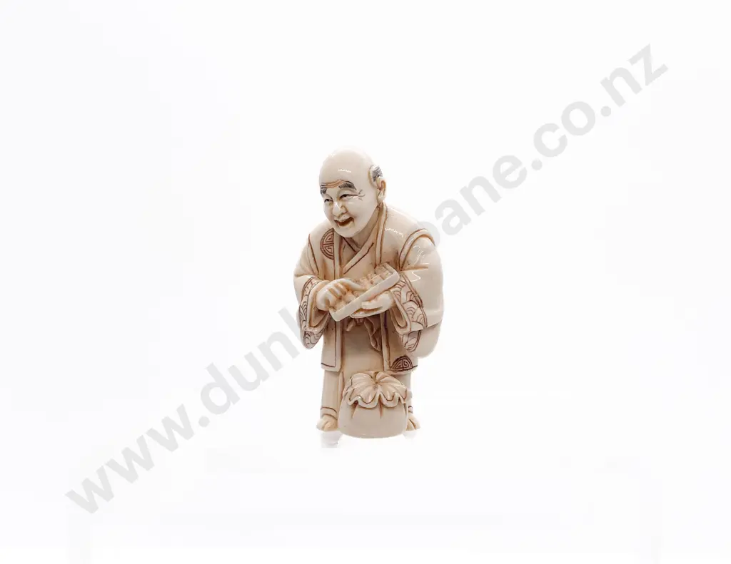 Signed Ivory Netsuke of a Trader with Abacus Image 1++