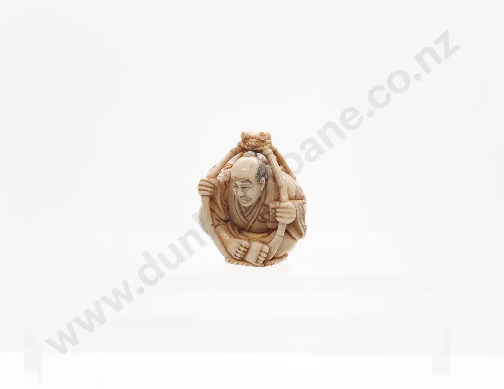 Signed and Stained Ivory Netsuke of a Traveller in a Basket Image 1++
