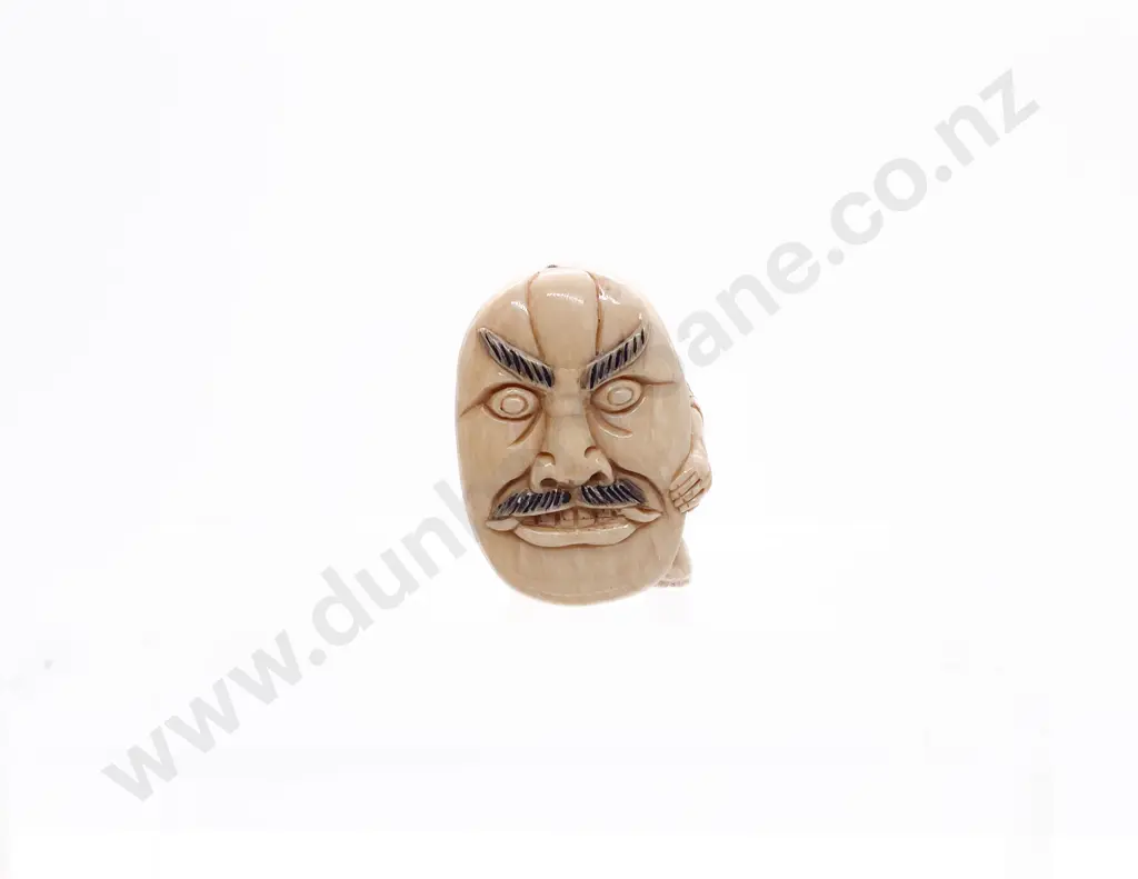 Stained Ivory Netsuke of a Actor with Oversize Mask on His Back Image 1++